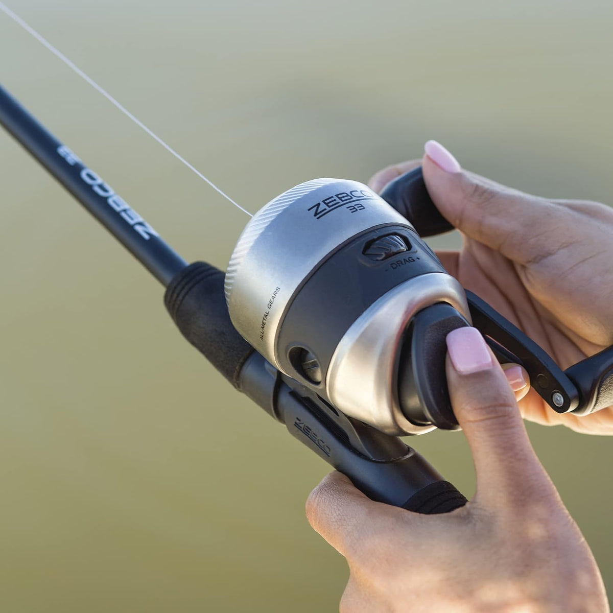 Silver/Black 6-Foot 2-Piece Fiberglass Spincast Reel and Fishing Rod Combo J8805